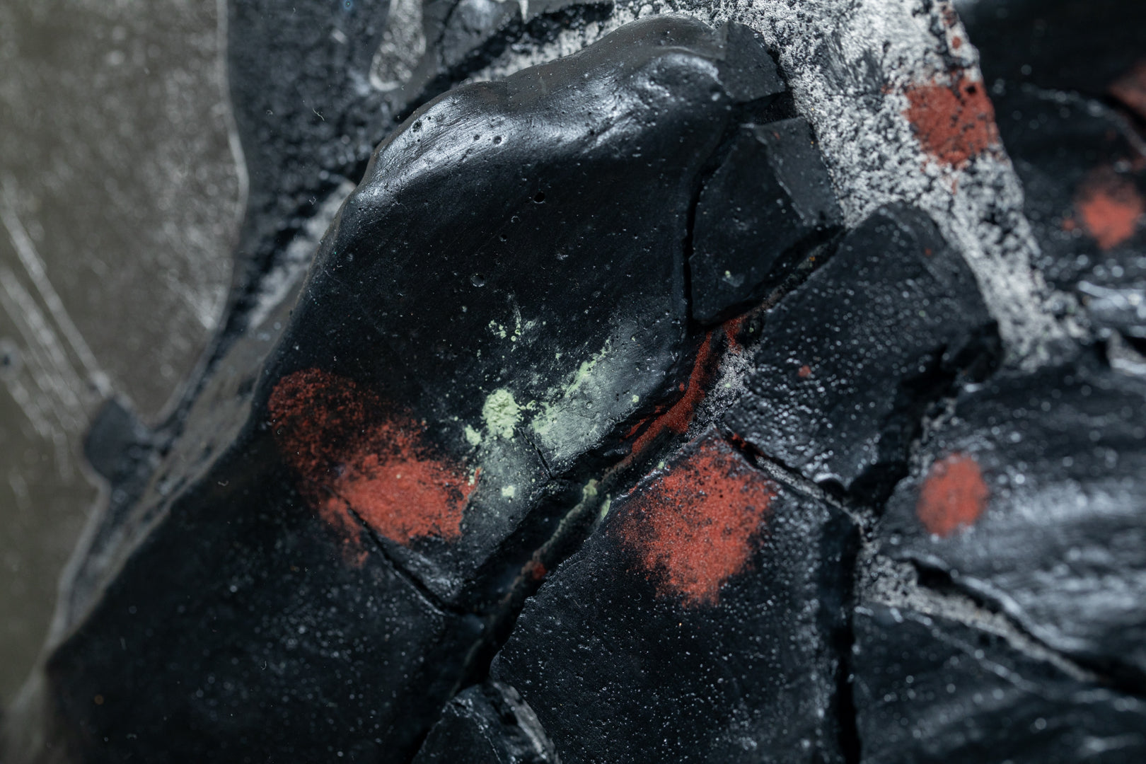 alt="Close-up detail of The Reclining Dragon Pine painting showing cracked ink texture and scattered malachite pigment by Takehiko Sugawara in Nihonga style"
